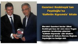 Gazeteci Keskinışık Feyzioğlu’na ‘Gafletin Kıyısında’ kitabını imzaladı