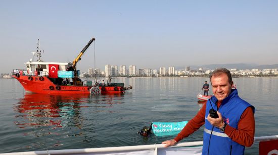 BA�KAN SE�ER,  �LK YAPAY RES�F DEN�ZE �ND�R�LD�